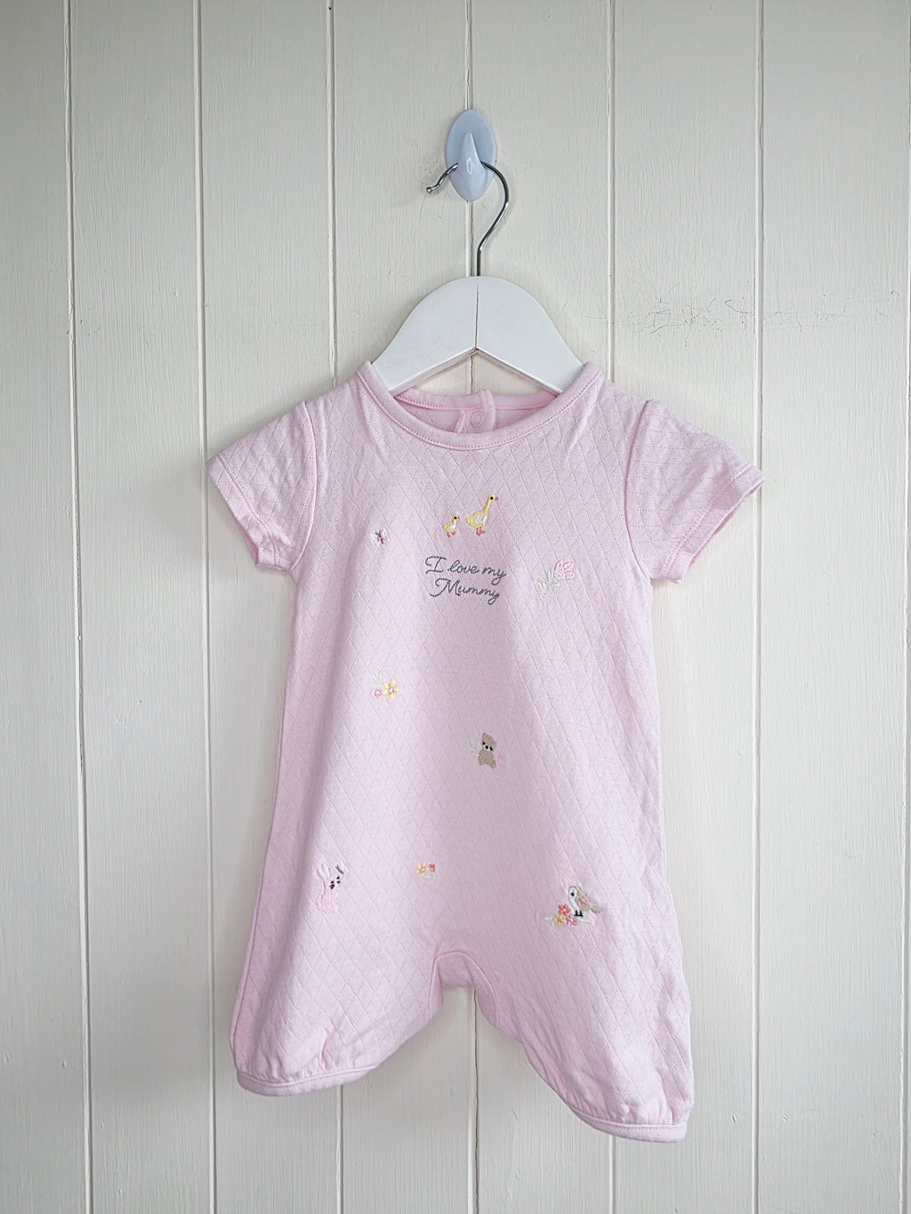 Nutmeg - 3-6 months girls pink romper featuring embroidered animals